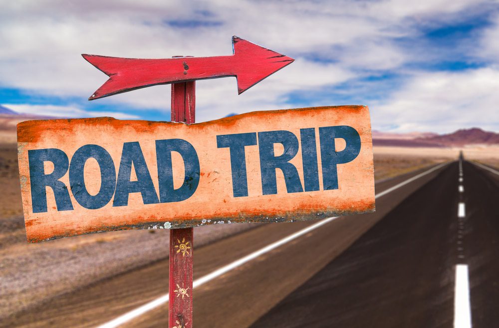 road sign that says "road trip"