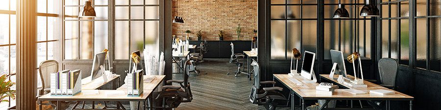 image of an office space with desks but no people