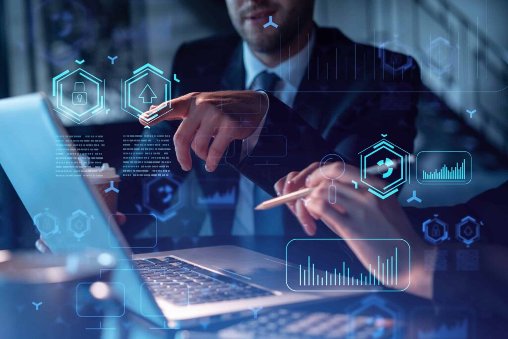 Two colleagues in formal wear working together to optimize business process by applying new technologies. Hi tech holograms over modern office background with panoramic windows