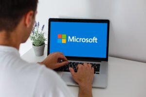 Notebook with Microsoft Windows 10 logo. Operating systems developed by Microsoft. High quality photo